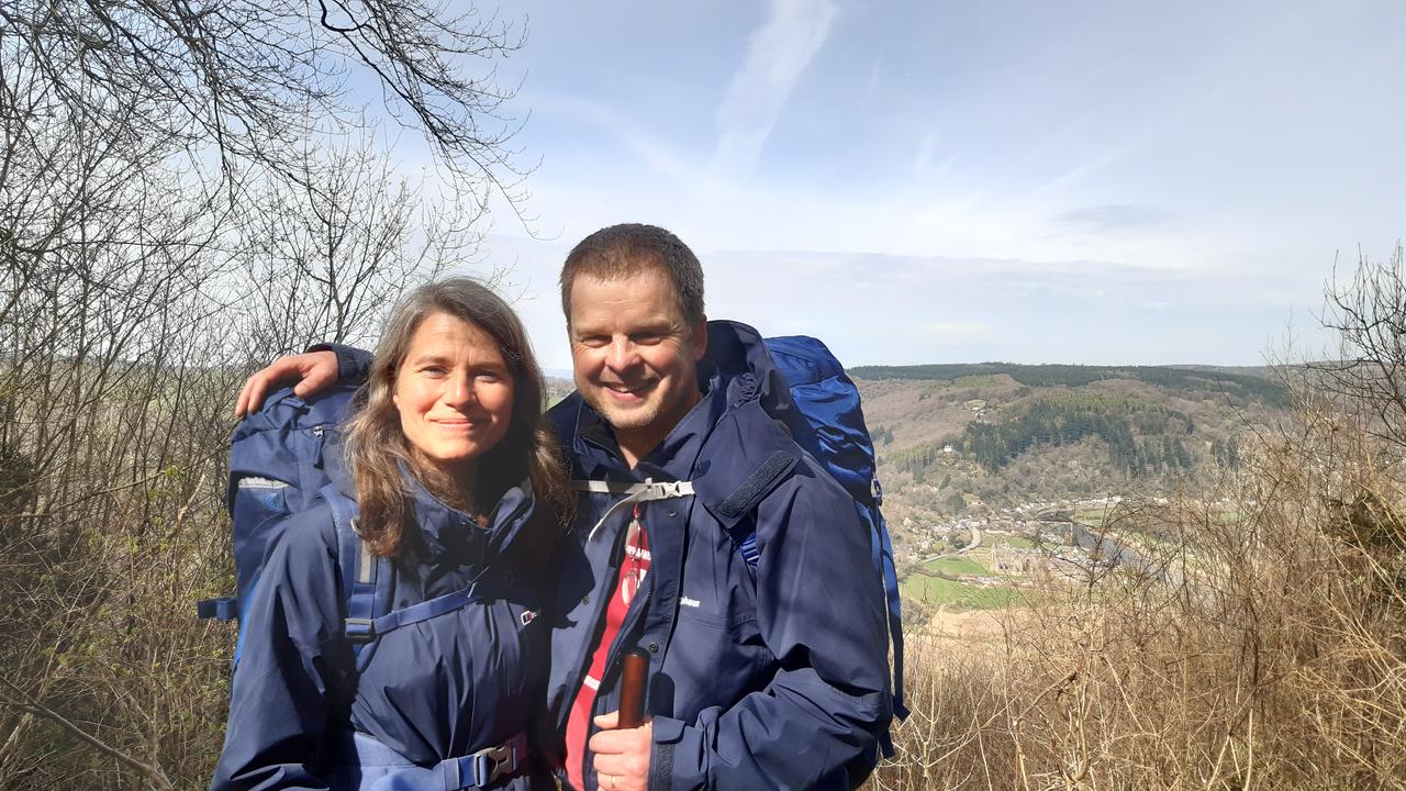 The two of us at the top of the cliff above Tintern Abbey (in the background).