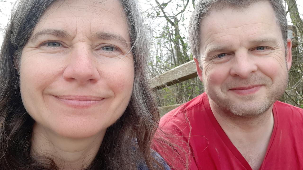 Elevenses, sitting on a bridge over a stream.