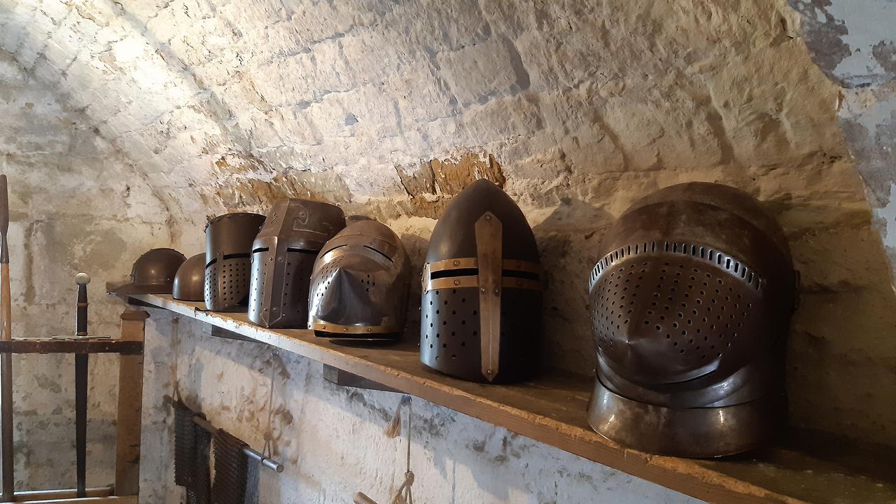 A selection of knight's helmets.